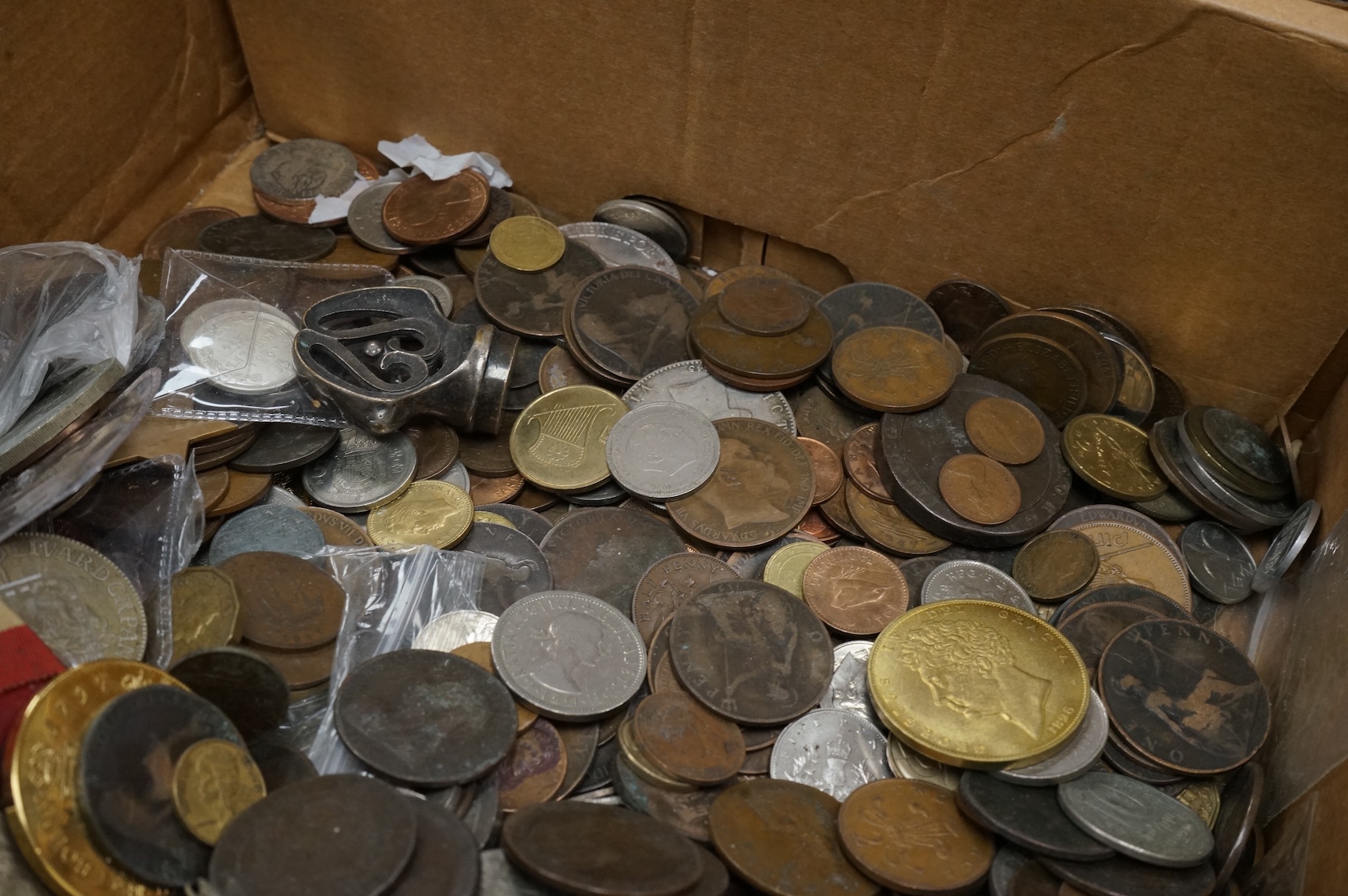 A large collection of mixed world coins, and replica coins